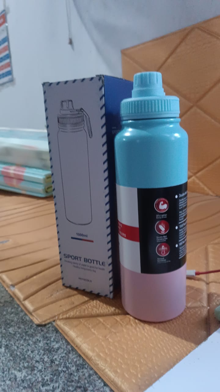 Stainless Steel Double Wall Vacuum-Insulated Drink Water Bottle (1000 ML / Mix Color) Stainless Steel Double Wall Vacuum-Insulated Drink Water Bottle (1000 ML / Mix Color)